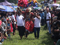 Nepalese devotees impersonate a deity and jump to the tunes of traditional instruments during the celebration of the Shikali Festival in Kho...