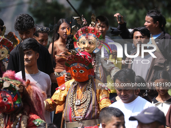 Nepalese devotees impersonate a deity during the celebration of the Shikali Festival in Khokana, Lalitpur, Nepal, on October 8, 2024. (