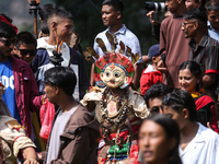 Nepalese devotees impersonate a deity during the celebration of the Shikali Festival in Khokana, Lalitpur, Nepal, on October 8, 2024. (