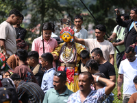 Nepalese devotees impersonate a deity during the celebration of the Shikali Festival in Khokana, Lalitpur, Nepal, on October 8, 2024. (