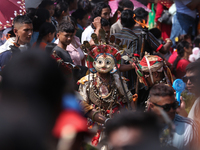 Nepalese devotees impersonate a deity during the celebration of the Shikali Festival in Khokana, Lalitpur, Nepal, on October 8, 2024. (