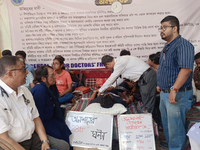 Senior doctors check the health conditions of the trainee and junior doctors who are on a hunger strike in protest against the RG Kar Medica...