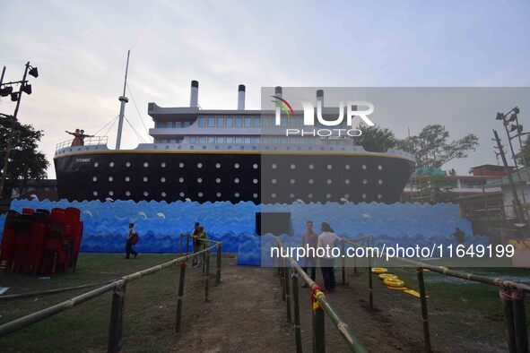 A 'pandal' is made in the shape of the ship 'Titanic' for the Durga Puja festival in Nagaon district, Assam, India, on October 8, 2024. 