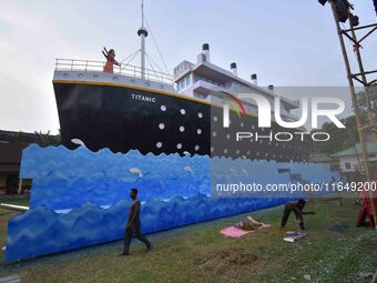 A 'pandal' is made in the shape of the ship 'Titanic' for the Durga Puja festival in Nagaon district, Assam, India, on October 8, 2024. (