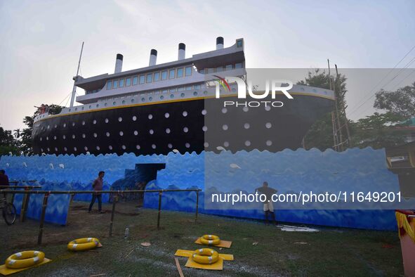 A 'pandal' is made in the shape of the ship 'Titanic' for the Durga Puja festival in Nagaon district, Assam, India, on October 8, 2024. 