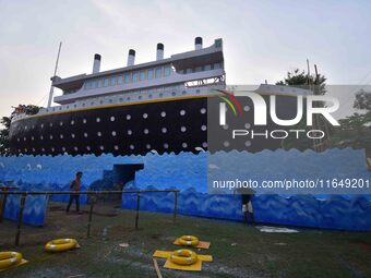 A 'pandal' is made in the shape of the ship 'Titanic' for the Durga Puja festival in Nagaon district, Assam, India, on October 8, 2024. (