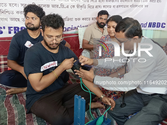 Senior doctors check the health conditions of the trainee and junior doctors who are on a hunger strike in protest against the RG Kar Medica...