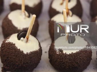 Candy apples with mini Oreo cookies are at a carnival in Markham, Ontario, Canada, on October 5, 2024. (