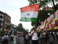 Doctors and citizens shout slogans during a protest march while junior doctors hold a hunger strike to protest against the rape and murder o...