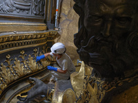 A view during the restoration works of the Chair of Saint Peter, created by Gian Lorenzo Bernini, located in the apse of St. Peter's Basilic...