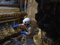 A view during the restoration works of the Chair of Saint Peter, created by Gian Lorenzo Bernini, located in the apse of St. Peter's Basilic...