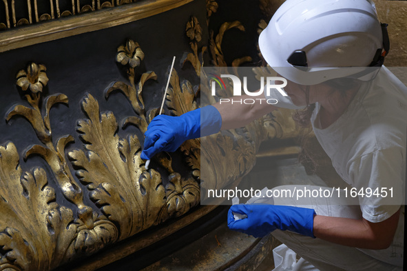 A view during the restoration works of the Chair of Saint Peter, created by Gian Lorenzo Bernini, located in the apse of St. Peter's Basilic...