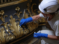 A view during the restoration works of the Chair of Saint Peter, created by Gian Lorenzo Bernini, located in the apse of St. Peter's Basilic...