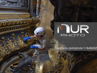 A view during the restoration works of the Chair of Saint Peter, created by Gian Lorenzo Bernini, located in the apse of St. Peter's Basilic...