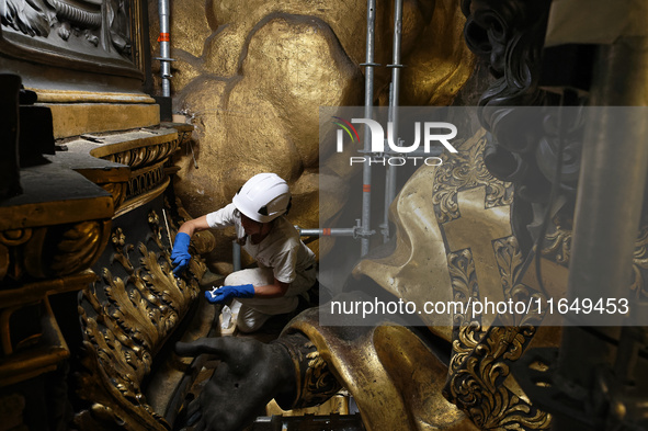 A view during the restoration works of the Chair of Saint Peter, created by Gian Lorenzo Bernini, located in the apse of St. Peter's Basilic...