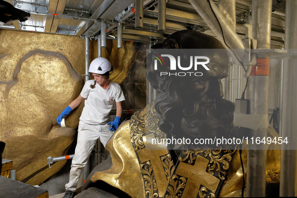 A view during the restoration works of the Chair of Saint Peter, created by Gian Lorenzo Bernini, located in the apse of St. Peter's Basilic...