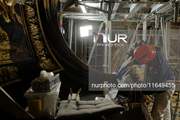 A view during the restoration works of the Chair of Saint Peter, created by Gian Lorenzo Bernini, located in the apse of St. Peter's Basilic...