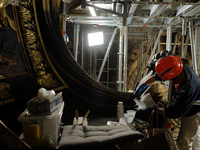 A view during the restoration works of the Chair of Saint Peter, created by Gian Lorenzo Bernini, located in the apse of St. Peter's Basilic...