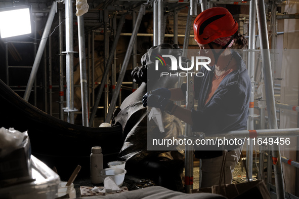 A view during the restoration works of the Chair of Saint Peter, created by Gian Lorenzo Bernini, located in the apse of St. Peter's Basilic...