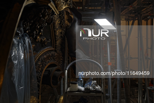 A view during the restoration works of the Chair of Saint Peter, created by Gian Lorenzo Bernini, located in the apse of St. Peter's Basilic...