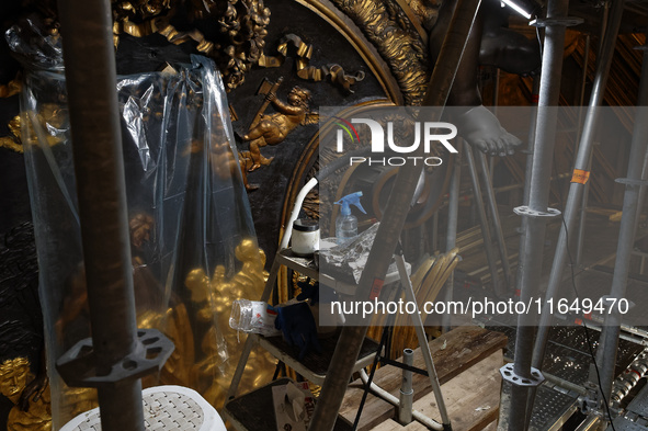 A view during the restoration works of the Chair of Saint Peter, created by Gian Lorenzo Bernini, located in the apse of St. Peter's Basilic...