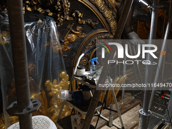 A view during the restoration works of the Chair of Saint Peter, created by Gian Lorenzo Bernini, located in the apse of St. Peter's Basilic...