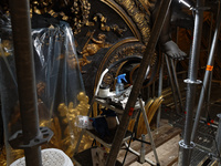 A view during the restoration works of the Chair of Saint Peter, created by Gian Lorenzo Bernini, located in the apse of St. Peter's Basilic...