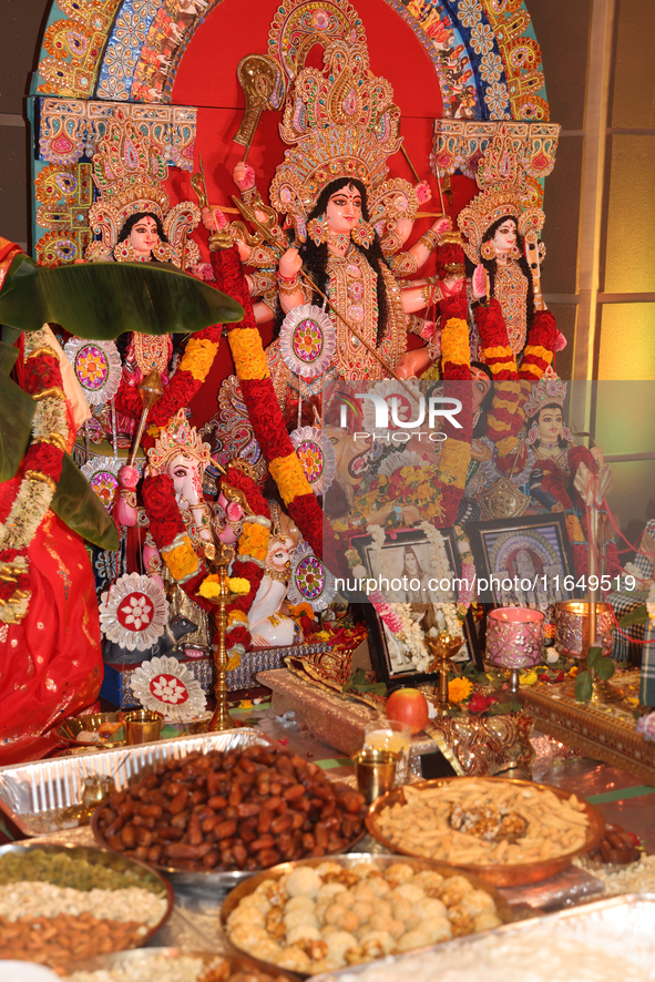 An adorned idol of the Goddess Durga is present during the Durga Puja festival at a pandal (temporary temple) in Mississauga, Ontario, Canad...