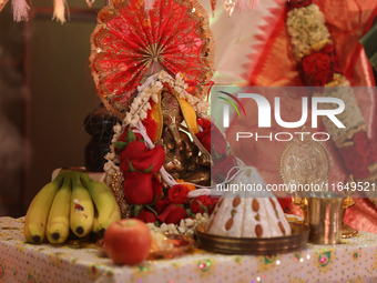 A small decorated idol of Lord Ganesh is seen during the Durga Puja festival at a pandal (temporary temple) in Mississauga, Ontario, Canada,...