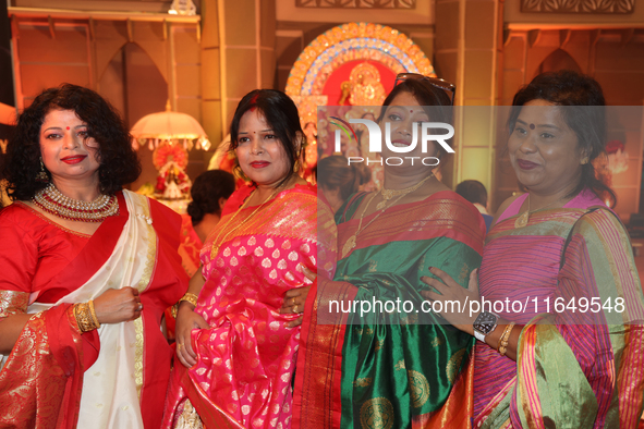 Bengali Hindus celebrate during the Durga Puja festival at a pandal (temporary temple) in Mississauga, Ontario, Canada, on October 6, 2024....