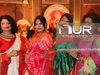 Bengali Hindus celebrate during the Durga Puja festival at a pandal (temporary temple) in Mississauga, Ontario, Canada, on October 6, 2024....