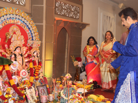 A Bengali Hindu priest performs prayers during the Durga Puja festival at a pandal (temporary temple) in Mississauga, Ontario, Canada, on Oc...