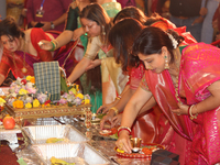 Bengali Hindu women perform prayers during the Durga Puja festival at a pandal (temporary temple) in Mississauga, Ontario, Canada, on Octobe...