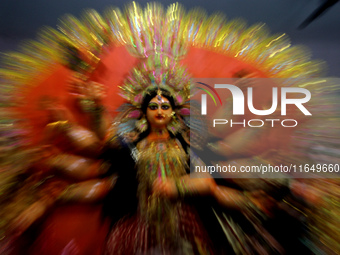 A Durga idol is seen at a worship venue on the eve of the Durga Puja festival in Bhubaneswar, the capital city of the eastern Indian state o...