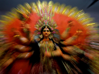 A Durga idol is seen at a worship venue on the eve of the Durga Puja festival in Bhubaneswar, the capital city of the eastern Indian state o...