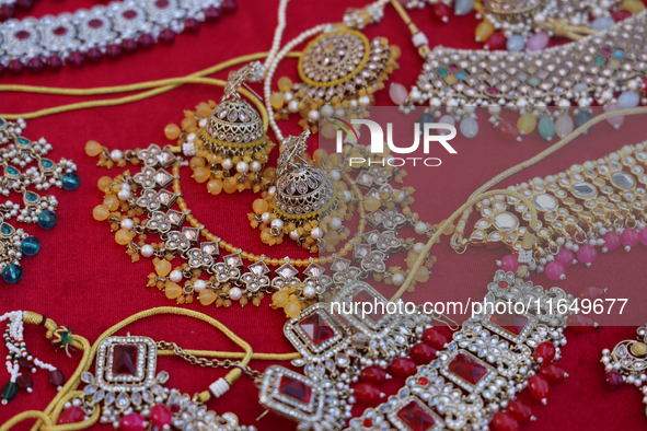 Indian jewellery is displayed at a small stall selling costume jewellery and temple jewellery during the Sree Ganesh Chaturthi Mahotsav fest...