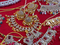 Indian jewellery is displayed at a small stall selling costume jewellery and temple jewellery during the Sree Ganesh Chaturthi Mahotsav fest...