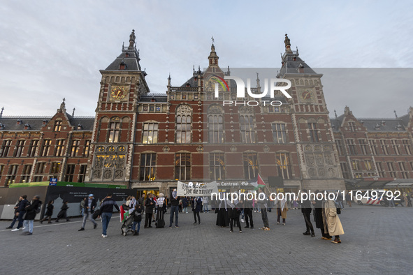 Hundreds of protesters flocked Amsterdam Centraal, the main central railway station and held a sit-in Pro-Palestine protest. A rally to mark...