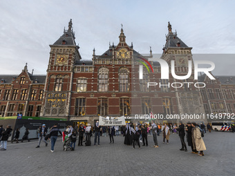 Hundreds of protesters flocked Amsterdam Centraal, the main central railway station and held a sit-in Pro-Palestine protest. A rally to mark...