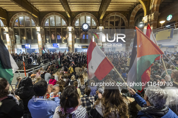 Hundreds of protesters flocked Amsterdam Centraal, the main central railway station and held a sit-in Pro-Palestine protest. A rally to mark...