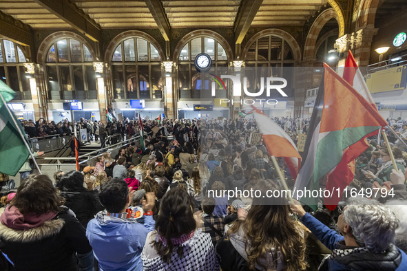 Hundreds of protesters flocked Amsterdam Centraal, the main central railway station and held a sit-in Pro-Palestine protest. A rally to mark...