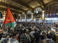 Hundreds of protesters flocked Amsterdam Centraal, the main central railway station and held a sit-in Pro-Palestine protest. A rally to mark...