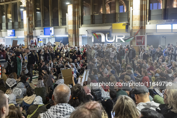 Hundreds of protesters flocked Amsterdam Centraal, the main central railway station and held a sit-in Pro-Palestine protest. A rally to mark...