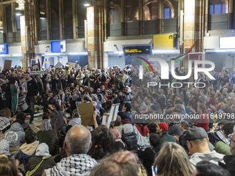 Hundreds of protesters flocked Amsterdam Centraal, the main central railway station and held a sit-in Pro-Palestine protest. A rally to mark...