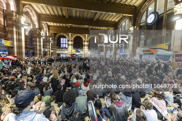 Hundreds of protesters flocked Amsterdam Centraal, the main central railway station and held a sit-in Pro-Palestine protest. A rally to mark...