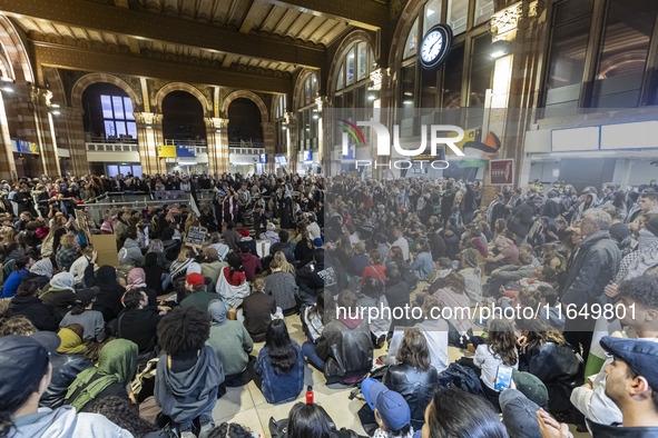 Hundreds of protesters flocked Amsterdam Centraal, the main central railway station and held a sit-in Pro-Palestine protest. A rally to mark...