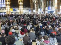 Hundreds of protesters flocked Amsterdam Centraal, the main central railway station and held a sit-in Pro-Palestine protest. A rally to mark...