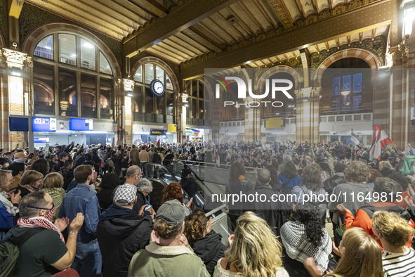 Hundreds of protesters flocked Amsterdam Centraal, the main central railway station and held a sit-in Pro-Palestine protest. A rally to mark...