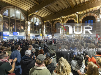 Hundreds of protesters flocked Amsterdam Centraal, the main central railway station and held a sit-in Pro-Palestine protest. A rally to mark...