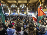 Hundreds of protesters flocked Amsterdam Centraal, the main central railway station and held a sit-in Pro-Palestine protest. A rally to mark...